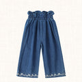 Denim trousers with elastic waist and floral embroidered hem, front view