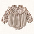 Ribbed beige romper with floral puff sleeves, front view