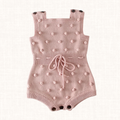 Knit romper with pom pom details, front view