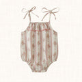 Floral stripe romper with tie straps, front view