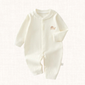 Ribbed romper with long sleeves and snap-button closure, front view