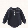 Knit romper with sailor collar and ivory trim, front view