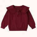 Bordeaux knit sweater with ruffled collar and tie-front bow