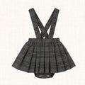 Grey plaid romper with pleated skirt, front view