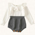 Gray knit romper with ruffled collar and button details, front view