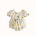 White romper with yellow floral embroidery and puff sleeves, front view