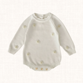 Ivory knit romper with tonal floral embroidery, front view